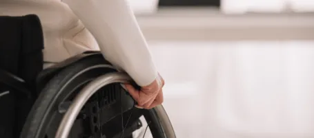 Woman in wheelchair from spinal cord injury