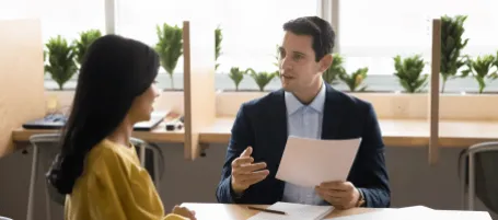 solicitor explaining paperwork to client
