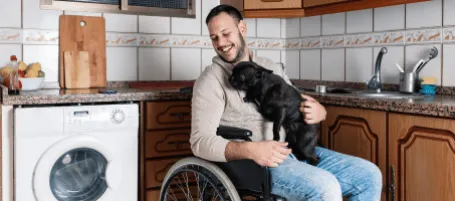 A person with a pet in a care
